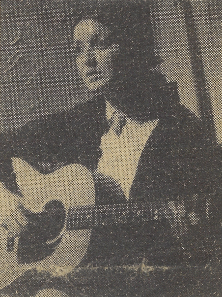 An old newspaper cutting of a grainy halftone photograph showing a young, dark-haired, white woman playing the guitar and singing.